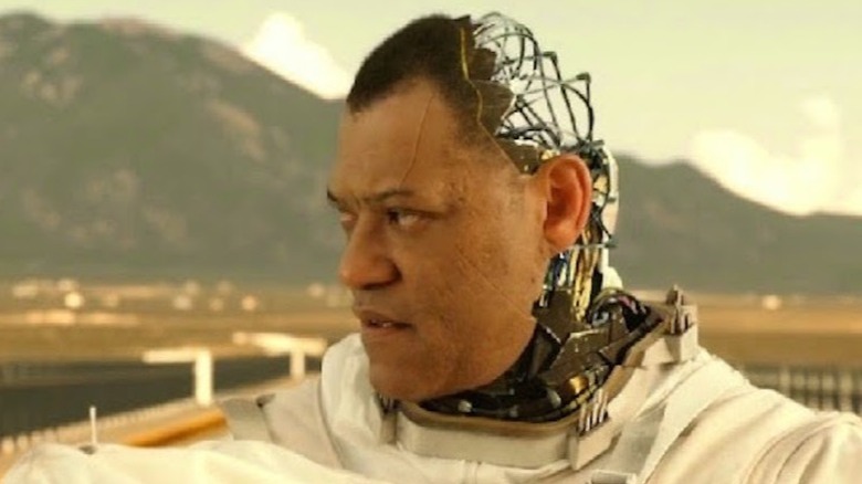 Laurence Fishburne as Dr. Wallace Damon with wiring showing