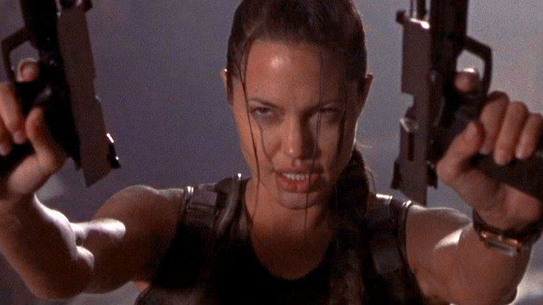 Angelina Jolie raises weapons