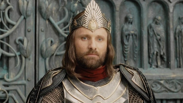 Aragorn stands crowned as king