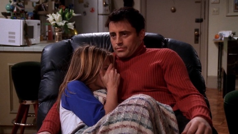 Rachel and Joey cuddle