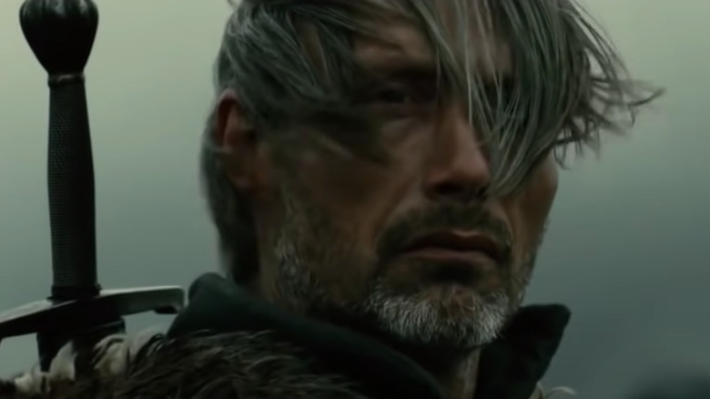 Mads Mikkelsen with white hair and beard