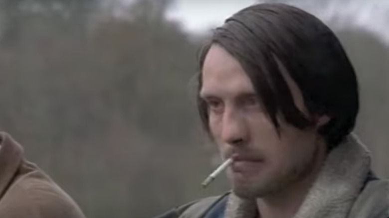 Mads Mikkelsen smoking