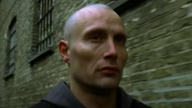 Mads Mikkelsen with shaved head