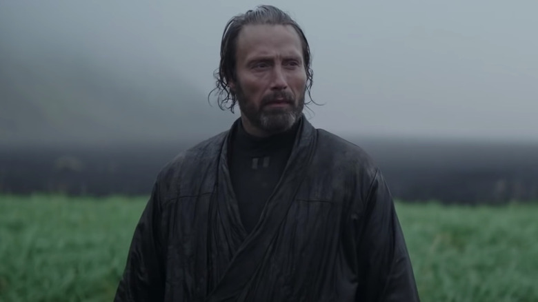 Mads Mikkelsen in field