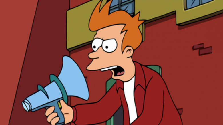 Fry speaking into backwards megaphone