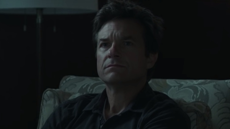 Jason Bateman sitting in chair