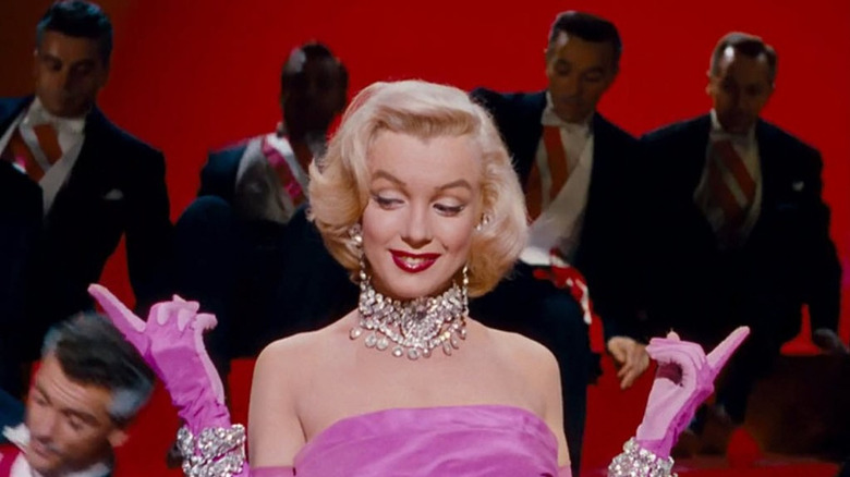 Monroe performing in pink and diamonds