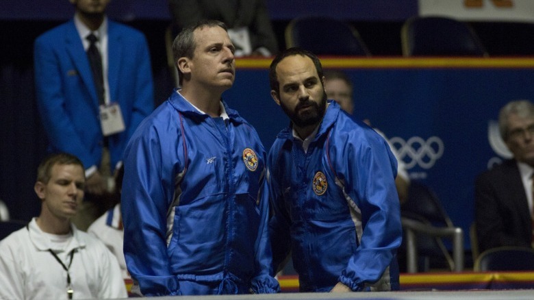 two men in athletic suits