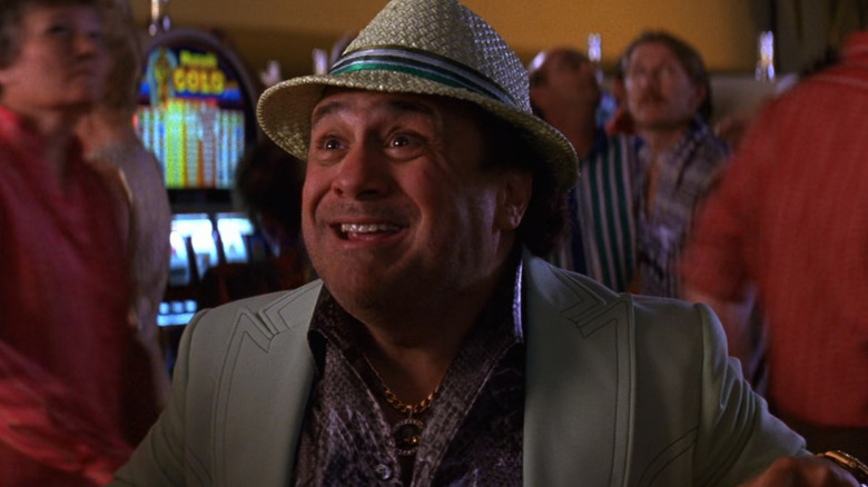 The Gambler smiles in a casino