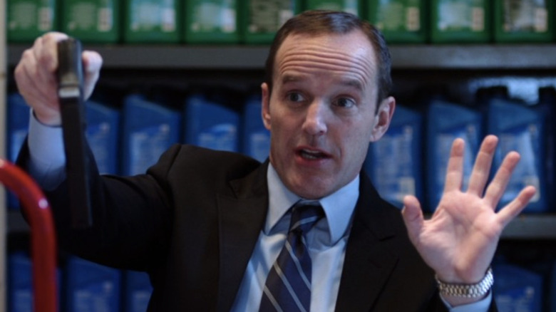 Agent Coulson surrendering to robbers