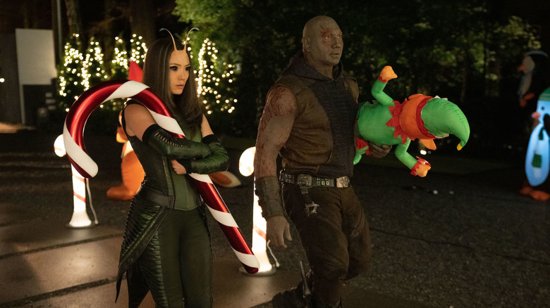 Mantis and Drax carrying holiday ornaments