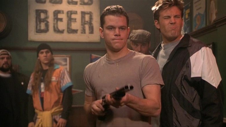 Matt Damon pointing shotgun