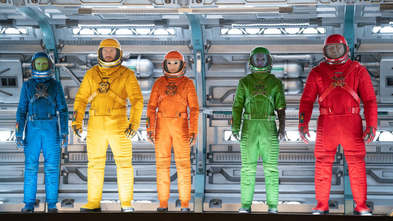 Guardians standing in space suits