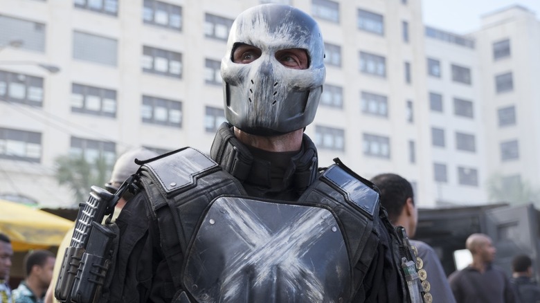 Crossbones wearing his armor in the street