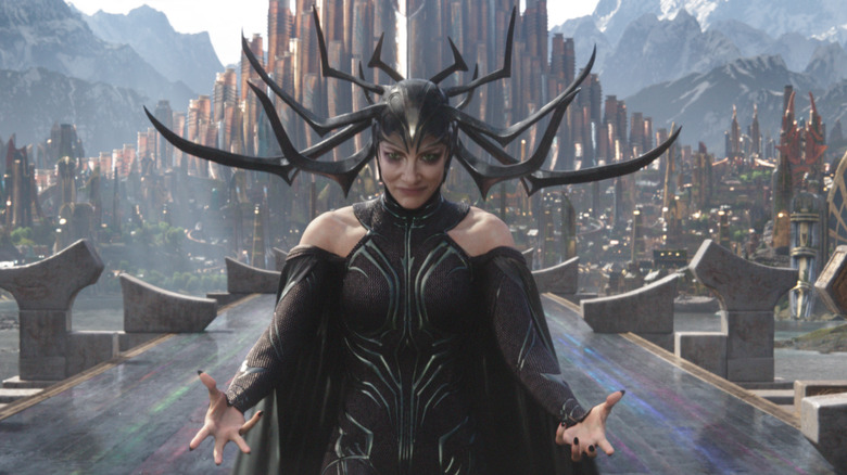 Hela stands on a bridge in Asgard