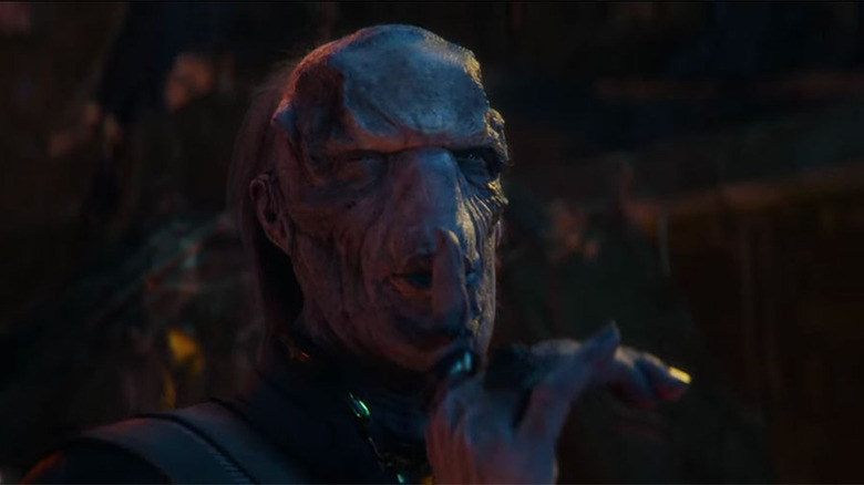 Ebony Maw puts a ringer to his lips