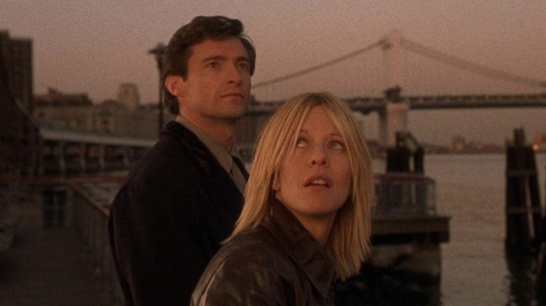 Kate and Leopold standing together