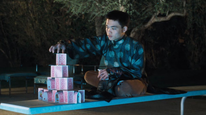 Yen stacks cards in Ocean's Eleven