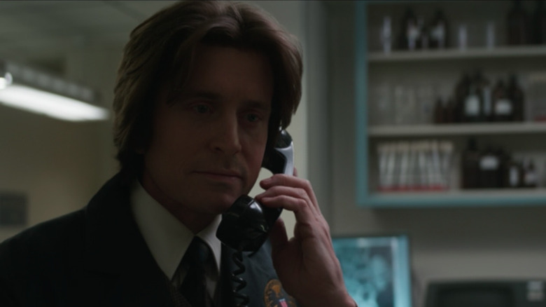 De-aged Michael Douglas on the phone