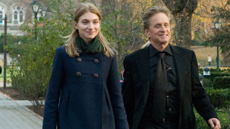 Ben and Allyson walking through campus