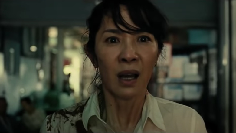 Michelle Yeoh in bloody shirt