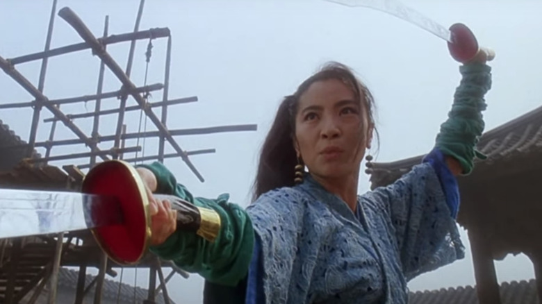 Michelle Yeoh with swords