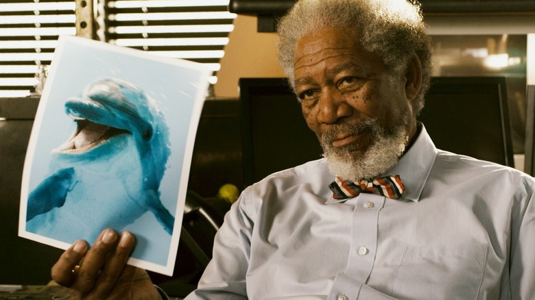 Dr. McCarthy holding dolphin photo