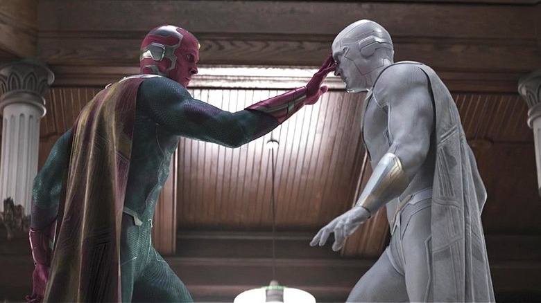Vision touching White Vision's forehead