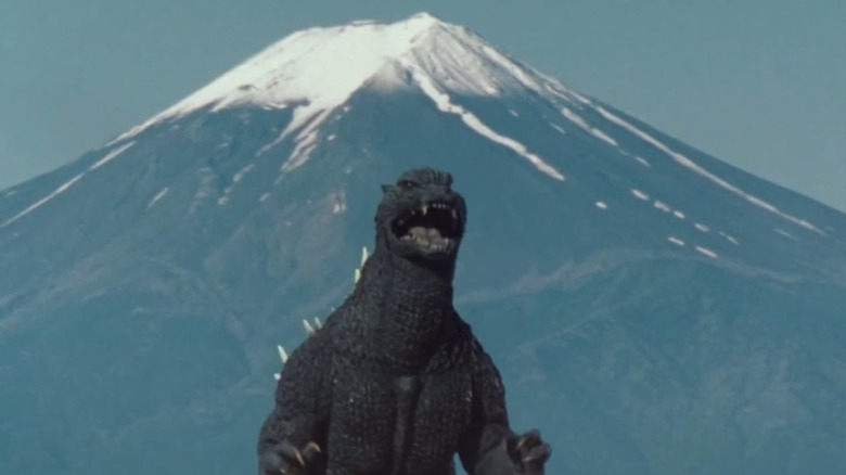 Godzilla in front of mountain