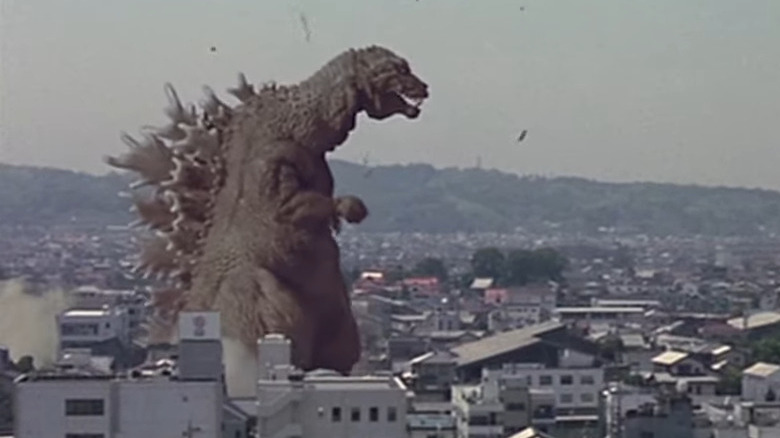 Godzilla stomps over buildings