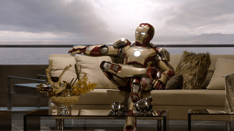 Robert Downey Jr. as Iron Man on couch