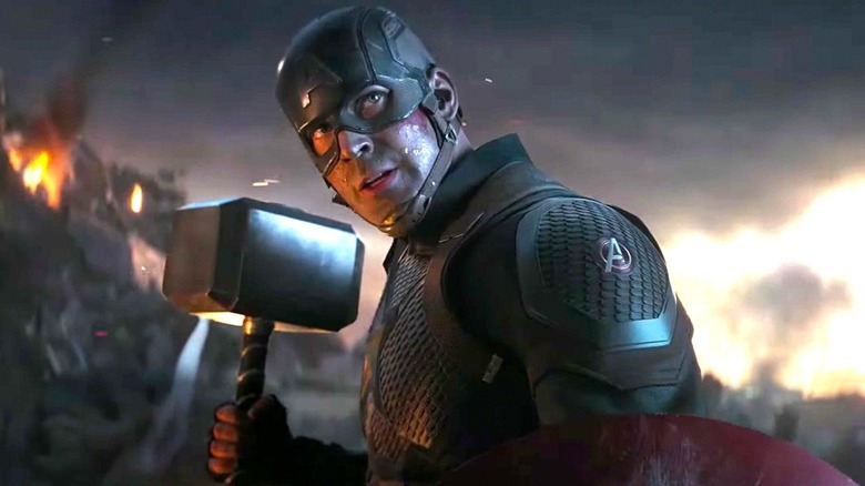 Captain America holds Mjolnir