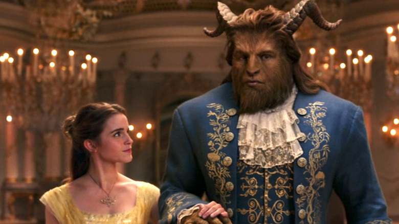 Belle and Beast walk arm in arm