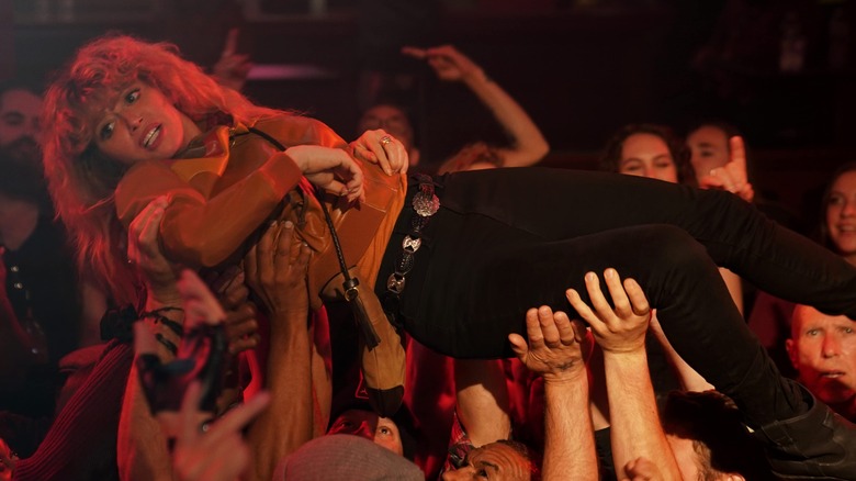 Charlie crowd surfs