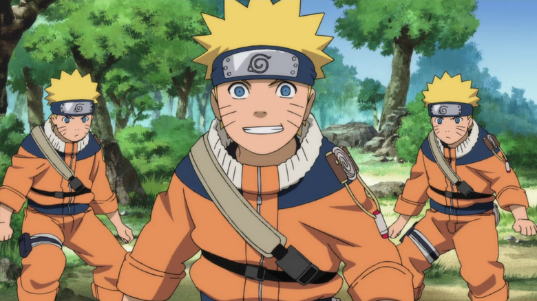 Naruto flanked by shadow clones