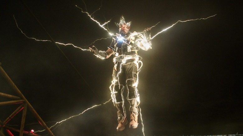 Electro uses his electricity powers to fly Spider-Man