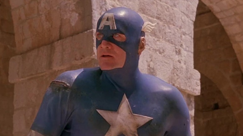 Captain America in front of a stone column