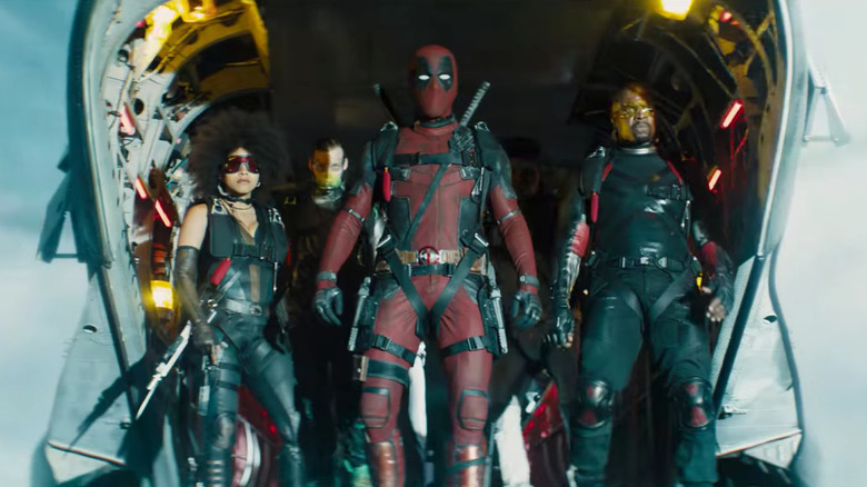 Deadpool leads X-Force out of a plane in "Deadpool 2" (2018)