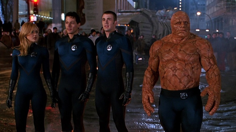 The Fantastic Four walk down the street in "Fantastic Four" (2005)