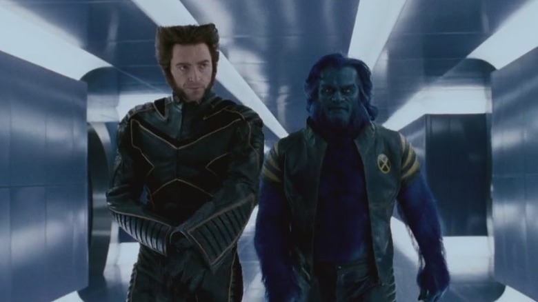 Beast and Wolverine walk in a hallway in "X-Men: The Last Stand" (2006)