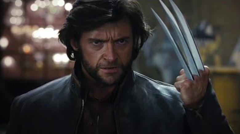 Wolverine holds up his claws