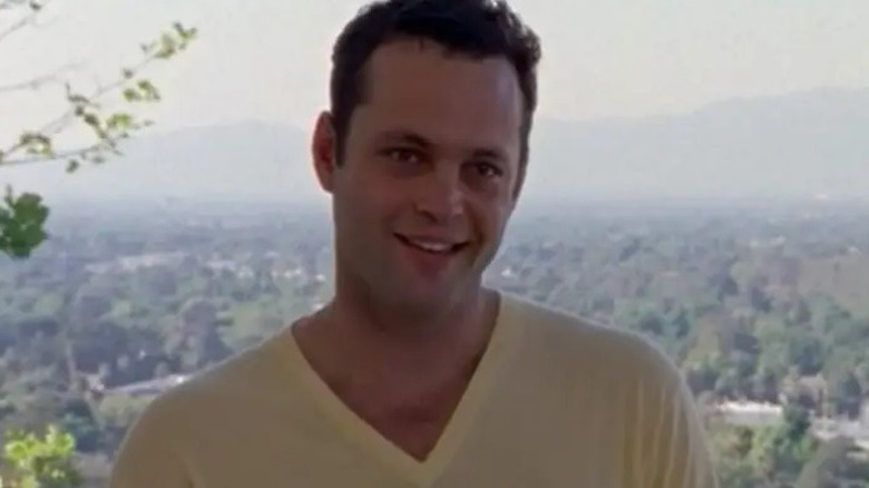 Vince Vaughn smiling in yellow shirt