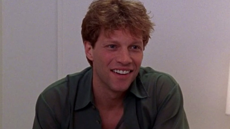 Jon Bon Jovi wearing green shirt