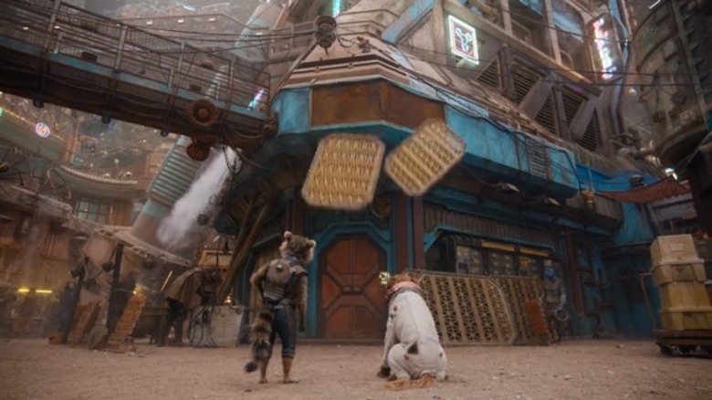 Rocket and Cosmo lifting a sign in Guardians of the Galaxy Holiday Special