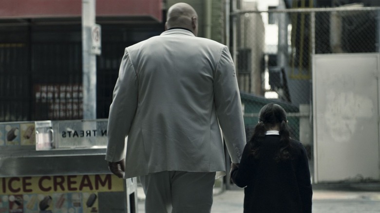 Kingpin walking with young Maya