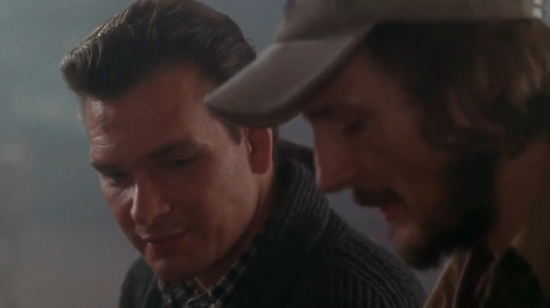 Patrick Swayze and Liam Neeson speaking in Next of Kin