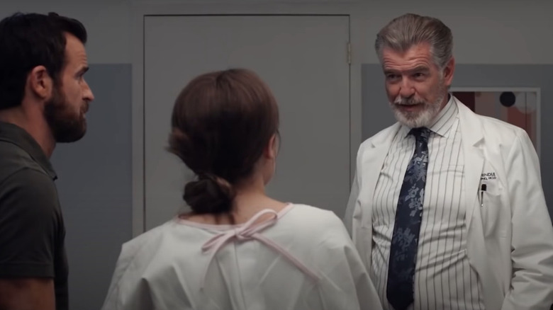 Pierce Brosnan in a lab coat