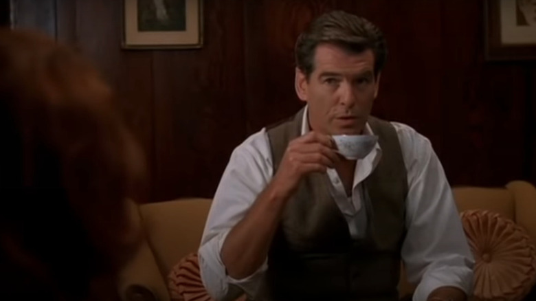 Pierce Brosnan sipping tea