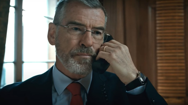 Pierce Brosnan on the phone