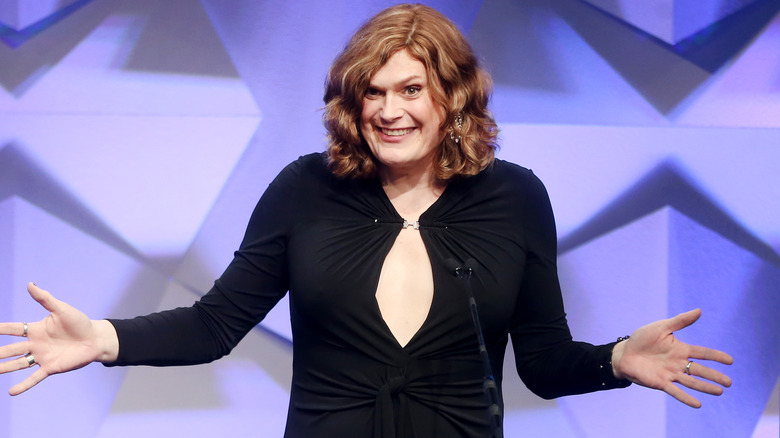 Lilly Wachowski grinning at podium